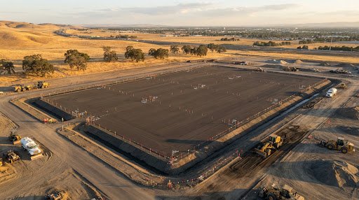 Laser-leveled compacted engineered building pad ready for concrete tilt-up in Stockton California